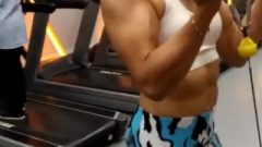 Asian FBB Milf Pumping Up Her Biceps