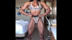 Chocolate Muscle Female Posing In Hotel Before Competition
