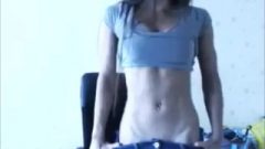 Young Web-cam Brunette Flexing Biceps And Abs